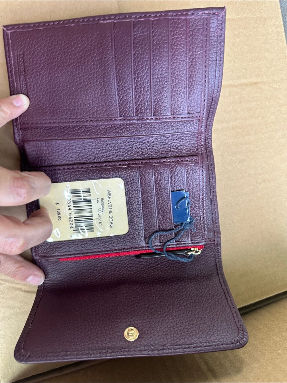 Dooney & Bourke compact pebbled
